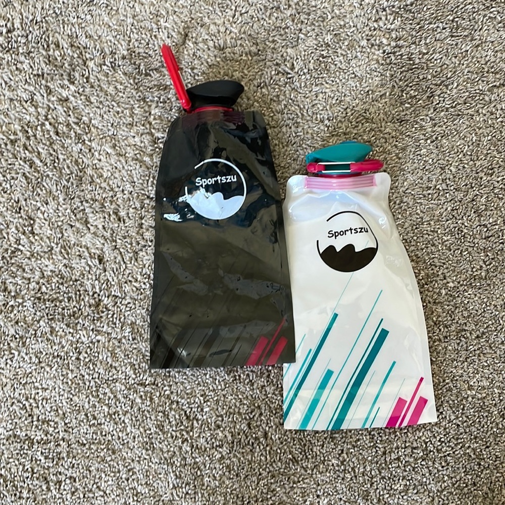 Bag water bottles with clip on handle
